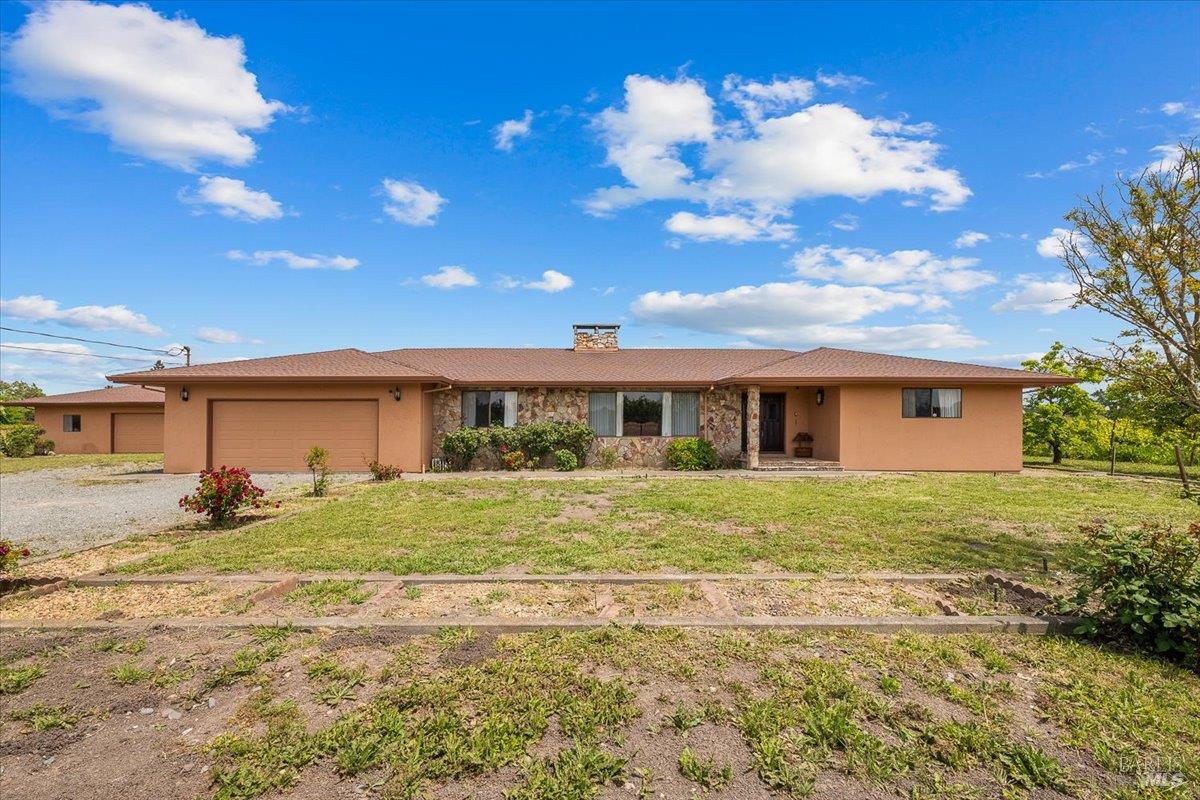 2062 Woolsey Road Fulton, CA 95439 - Photo 2 of 44 a view of a big yard with a house