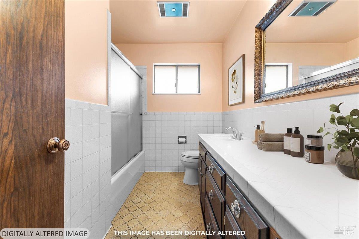 2062 Woolsey Road Fulton, CA 95439 - Photo 24 of 44 a bathroom with a sink a toilet and shower