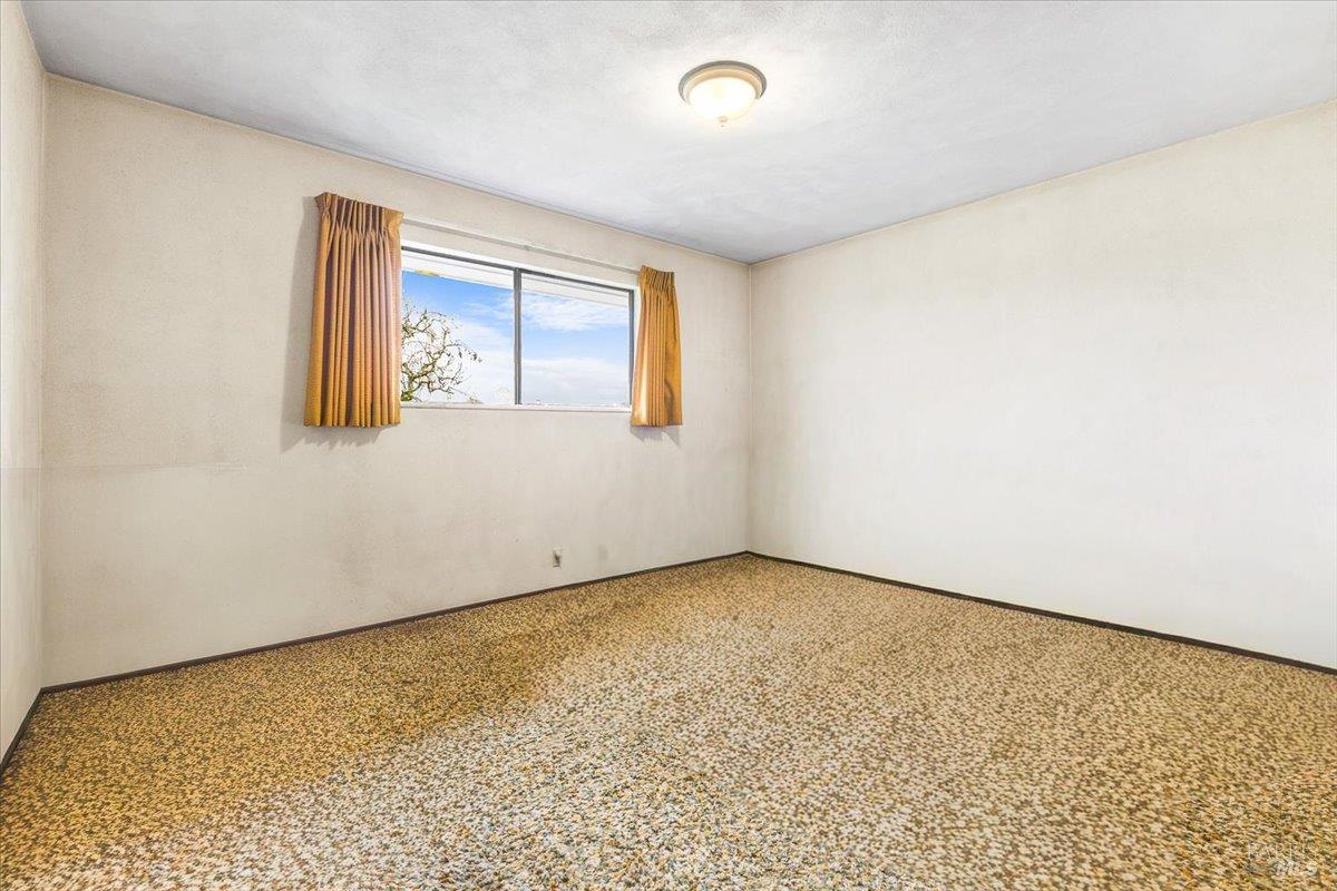 2062 Woolsey Road Fulton, CA 95439 - Photo 26 of 44 an empty room with windows