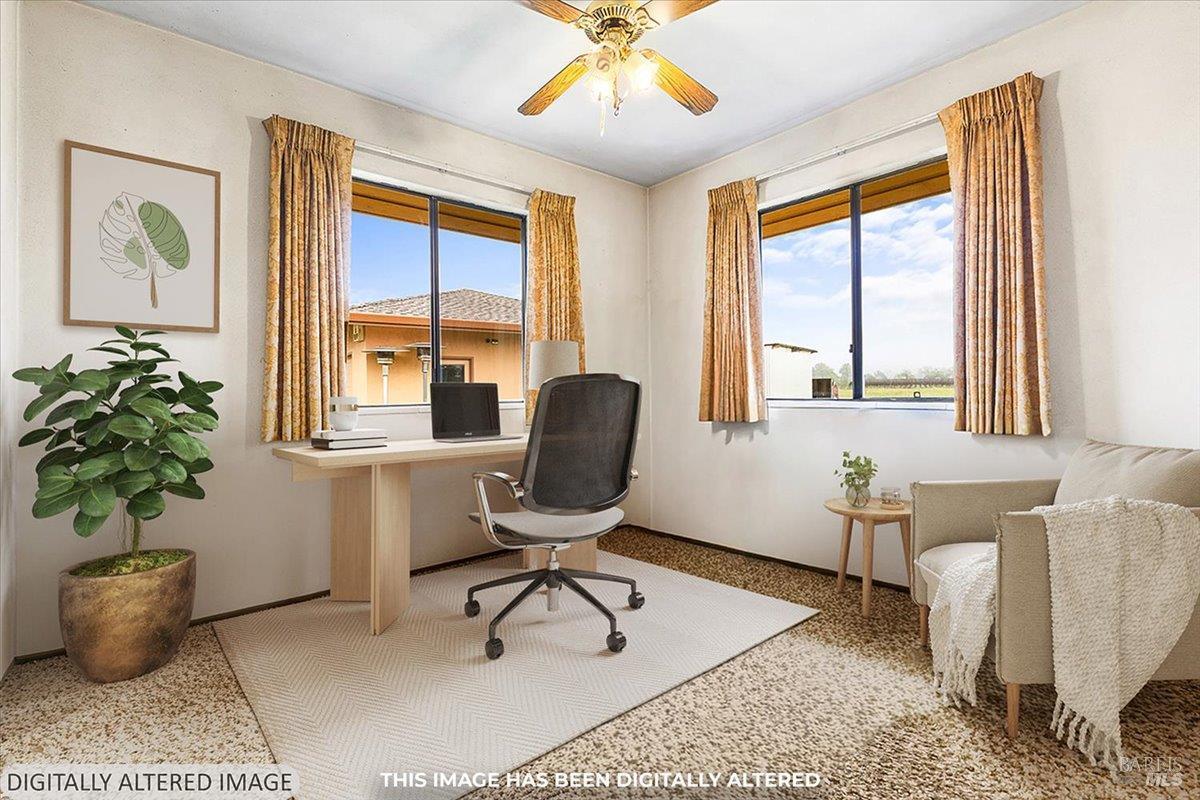 2062 Woolsey Road Fulton, CA 95439 - Photo 27 of 44 a living room with furniture and a potted plant