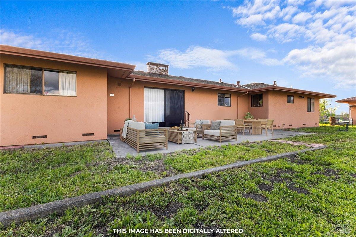2062 Woolsey Road Fulton, CA 95439 - Photo 30 of 44 a backyard of a house with table and chairs
