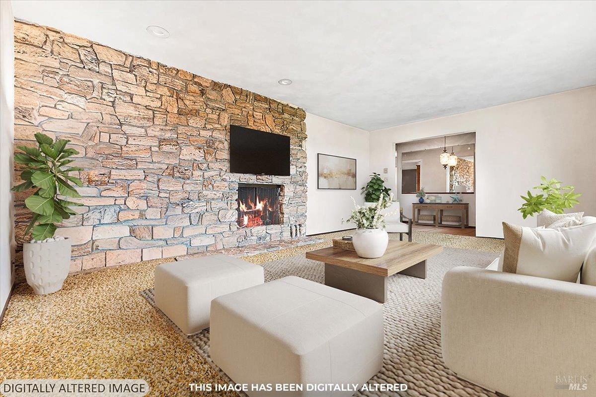 2062 Woolsey Road Fulton, CA 95439 - Photo 6 of 44 a living room with furniture and a flat screen tv
