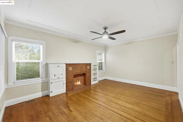 a kitchen with granite countertop a stove a sink and a microwave
