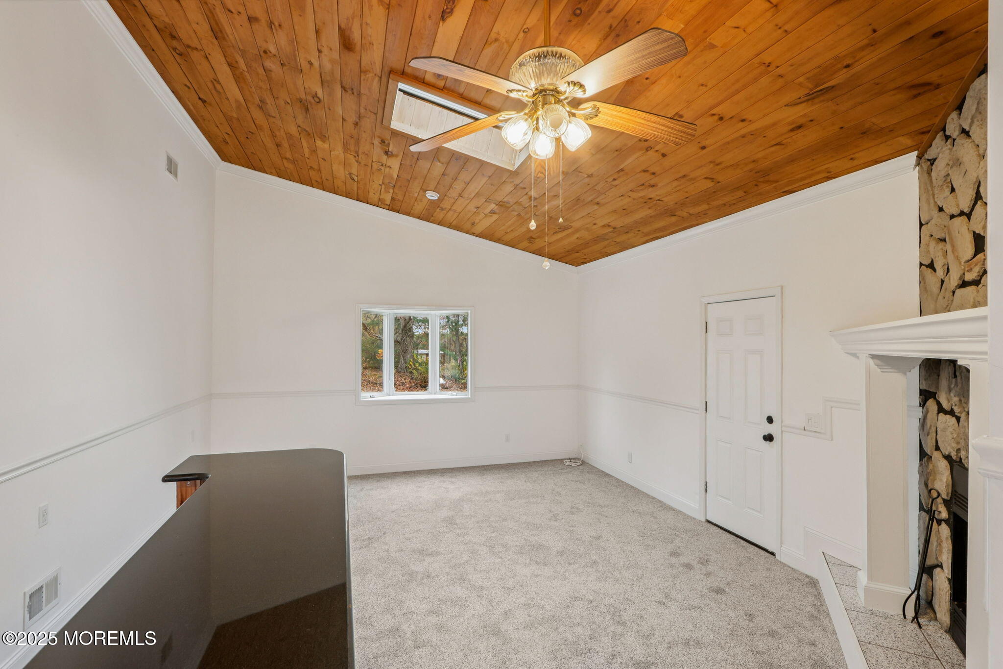 1100 Green Grove Road Neptune Township, NJ 07753 - Photo 15 of 52 a view of a livingroom with a ceiling fan
