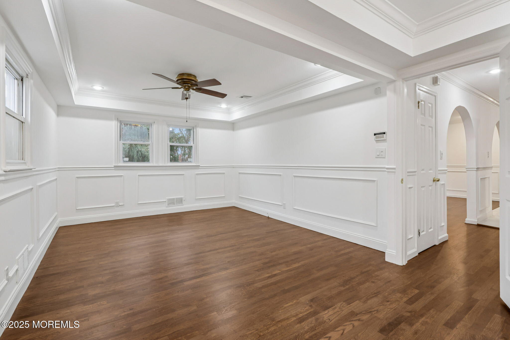 1100 Green Grove Road Neptune Township, NJ 07753 - Photo 19 of 52 an empty room with wooden floor and windows