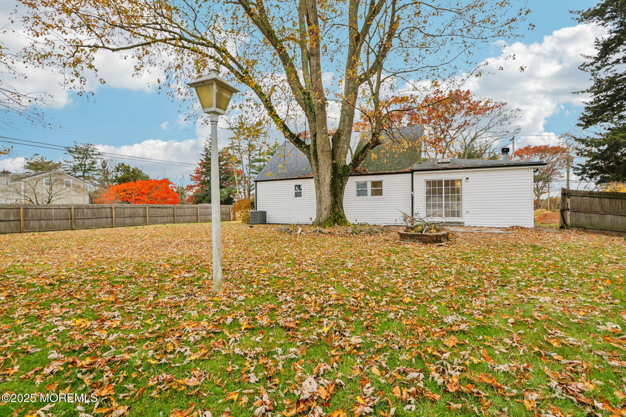 1100 Green Grove Road Neptune Township, NJ 07753 - Photo 33 of 52 a view of a house with a yard