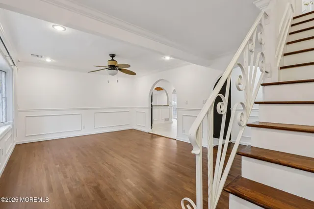 a view of entryway with wooden floor