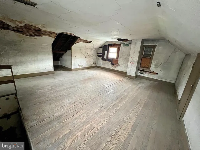 a view of a kitchen with a sink and a stove