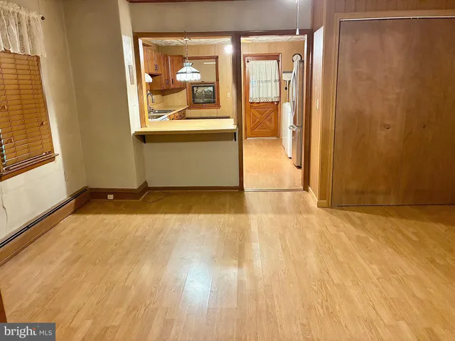 a large kitchen with cabinets