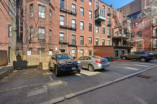 a car parked in front of a building