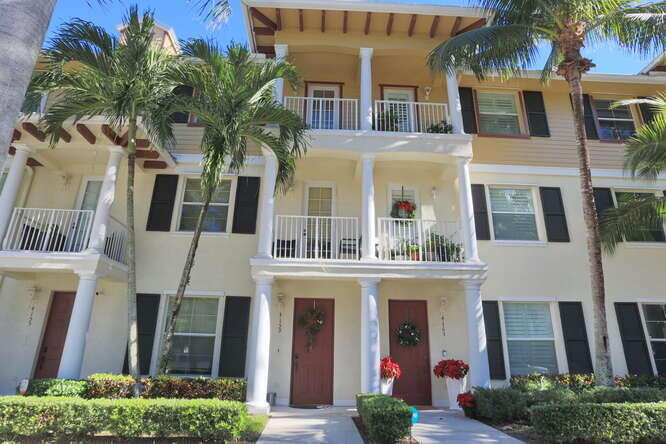 a view of a building with a garden