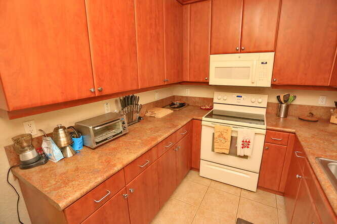 4159 Main Street Jupiter, FL 33458 - Photo 11 of 39 a utility room with dryer and washer