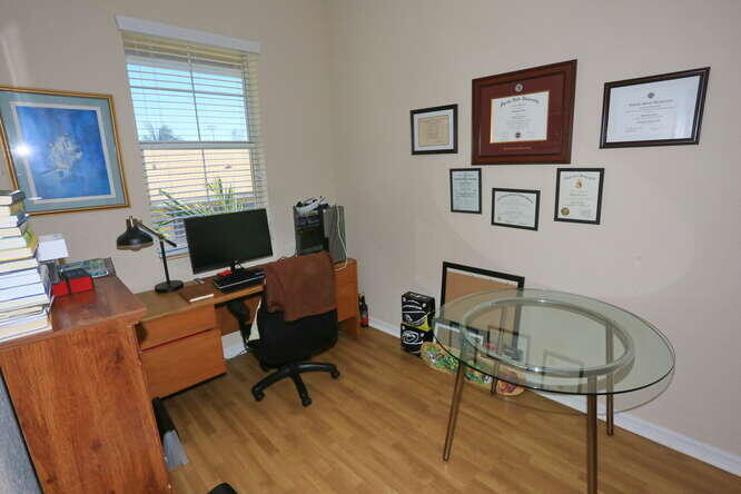4159 Main Street Jupiter, FL 33458 - Photo 31 of 39 a view of a workspace with furniture and a window