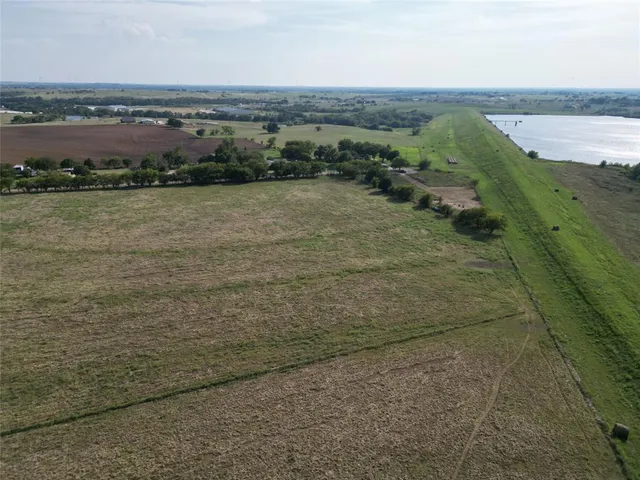 a view of a lake from a yard