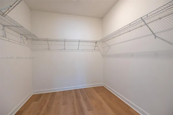 a view of a room with racks on the wall