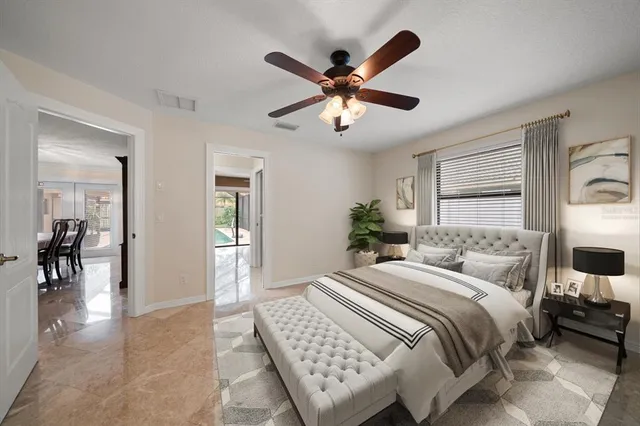 a view of swimming pool with a patio