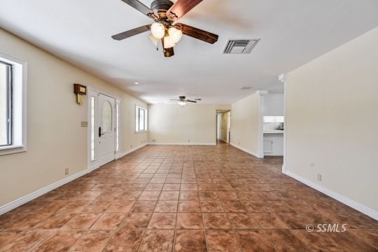 418 North Inyo Street Ridgecrest, CA 93555 - Photo 4 of 35 a view of an empty room with a window