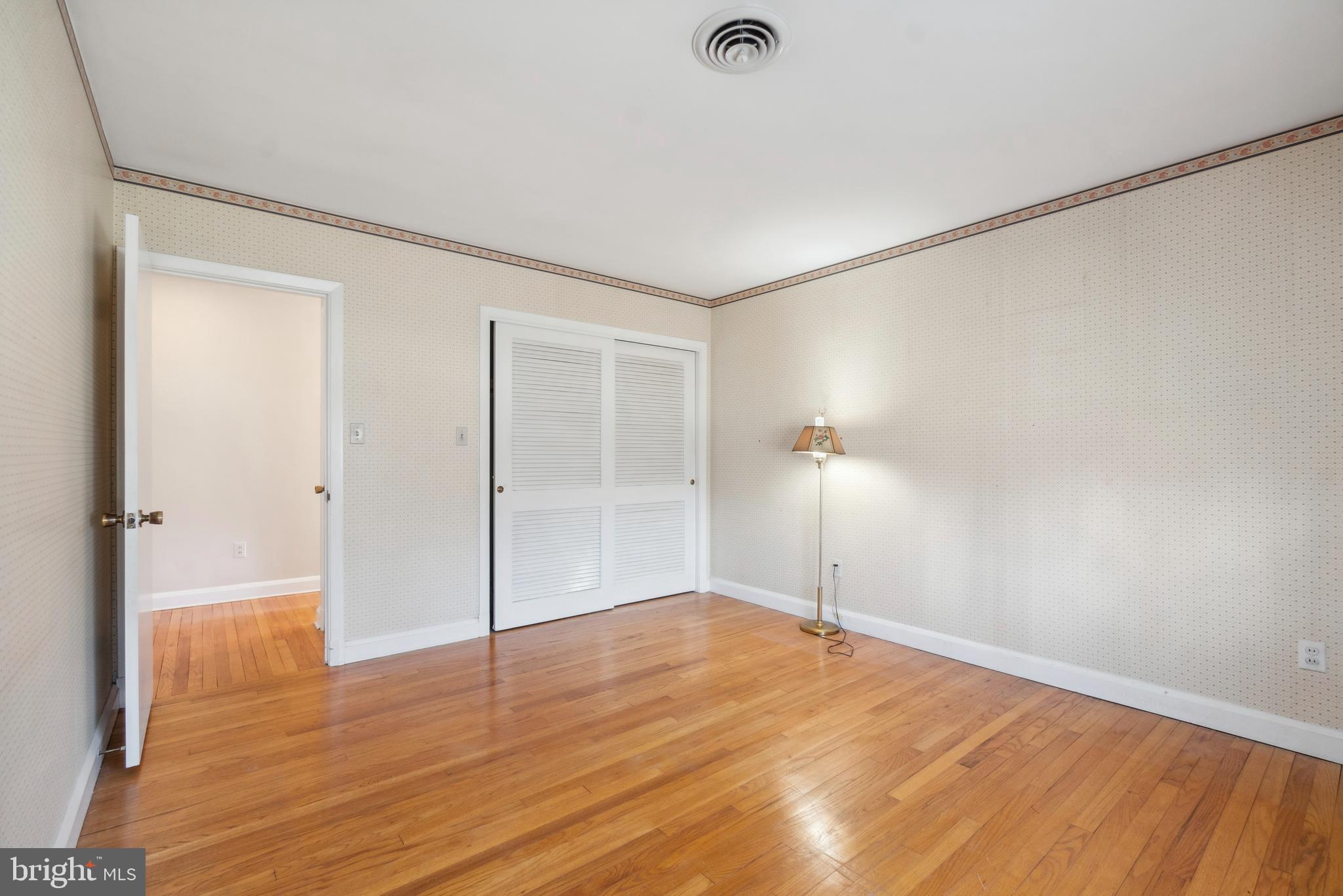 4001 Crescent Road Ellicott City, MD 21042 - Photo 31 of 41 a view of empty room with wooden floor