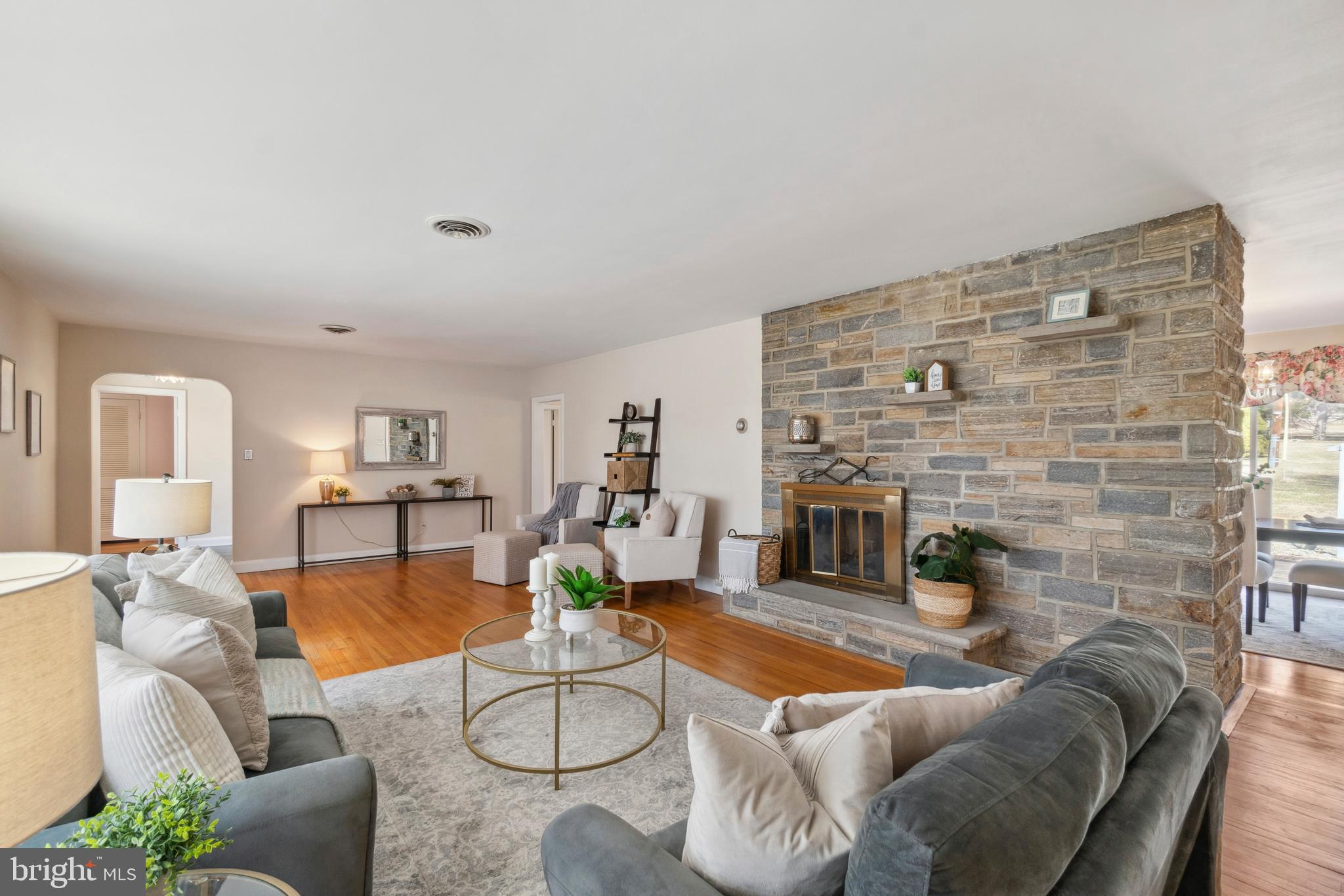 4001 Crescent Road Ellicott City, MD 21042 - Photo 8 of 41 a living room with furniture and a fireplace