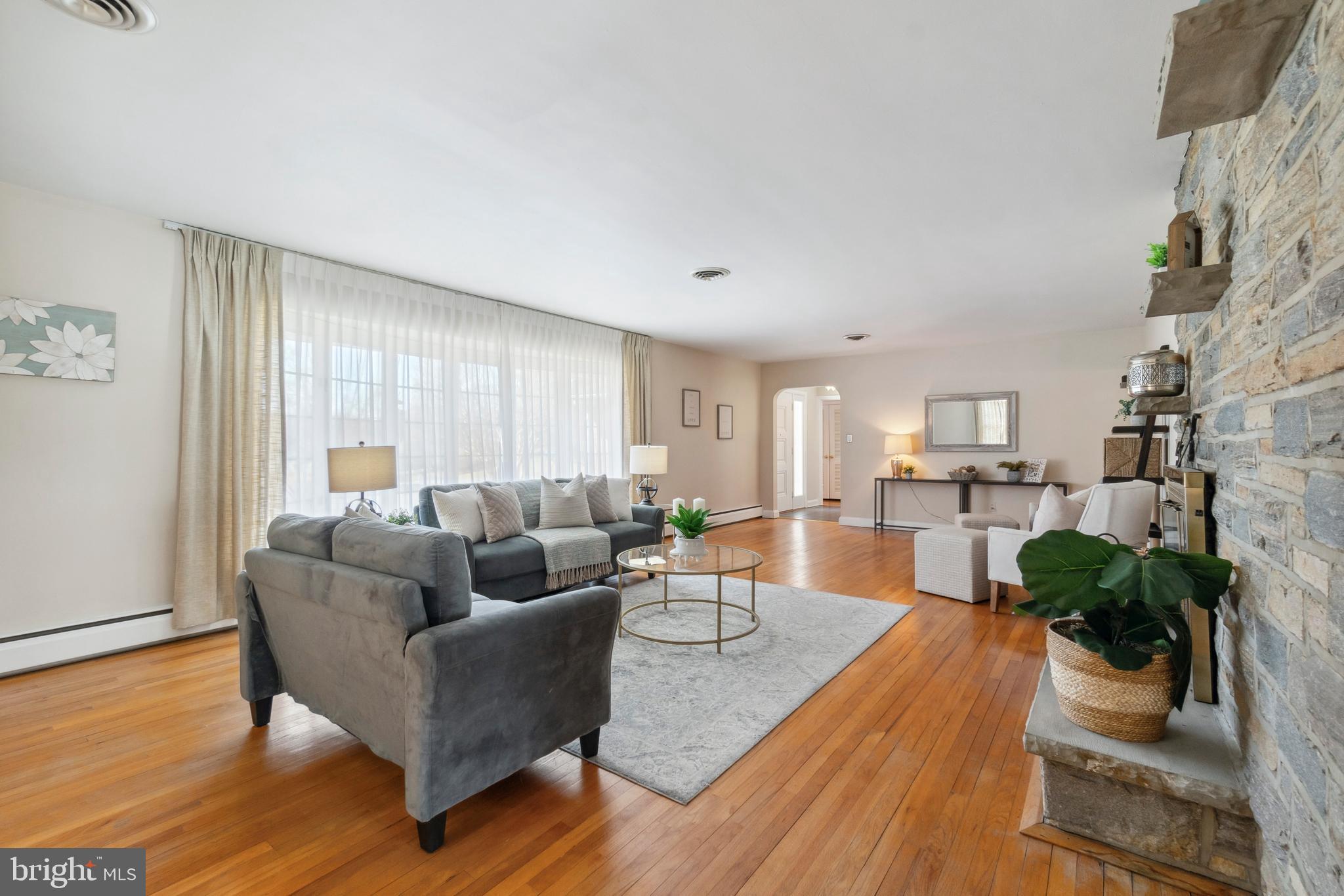 4001 Crescent Road Ellicott City, MD 21042 - Photo 9 of 41 a living room with furniture and a wooden floor