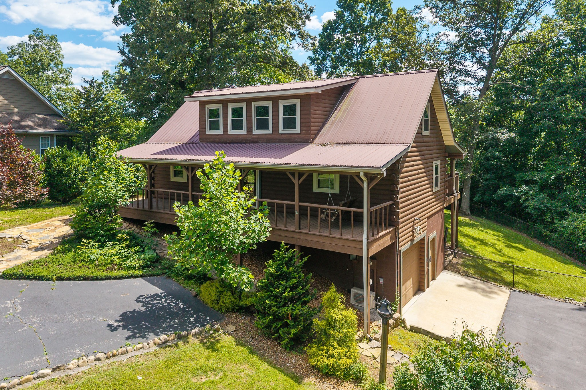 142 Rayahs Way Quebeck, TN 38579 - Photo 16 of 73 a front view of a house with a yard