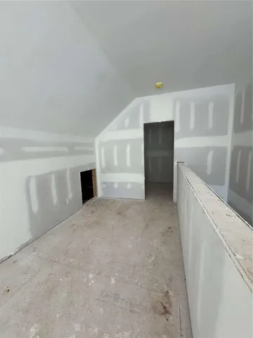 a view of empty room with front door