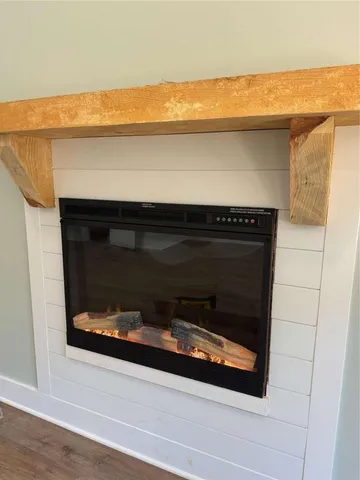 a stove top oven sitting inside of a kitchen