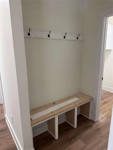 a view of entryway with wooden floor