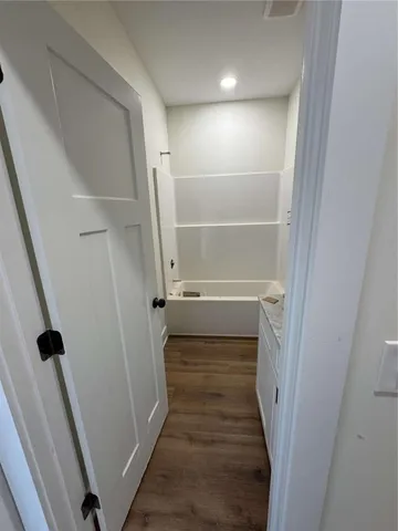 a view of entryway with wooden floor