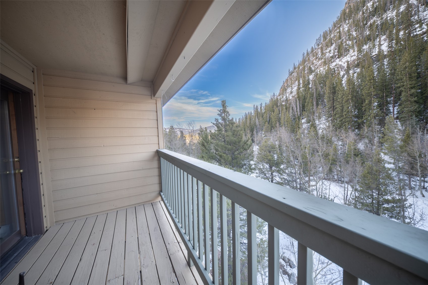 400 West Main Street, Unit 306 Frisco, CO 80443 - Photo 12 of 25 a view of a balcony with wooden floor