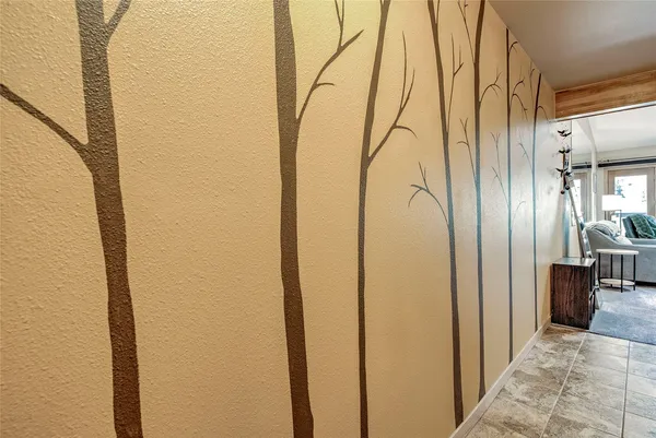 a view of entryway with wooden floor