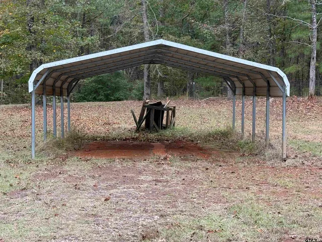 a view of a hallway with an empty room
