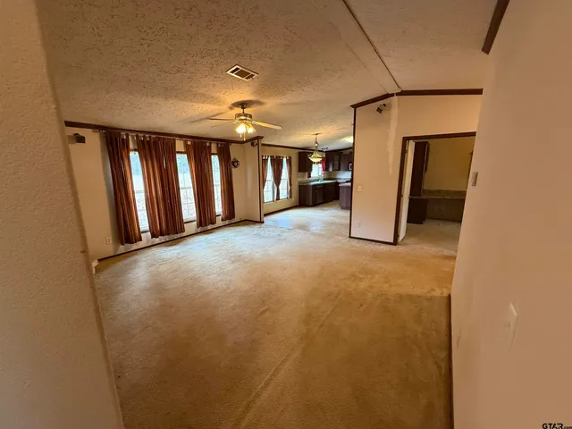 a kitchen with sink cabinets and window