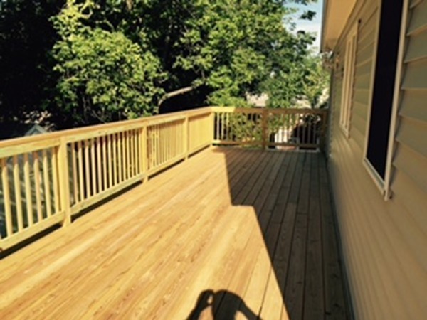 60 Valley Road Dracut, MA 01826 - Photo 13 of 15 a view of balcony with wooden floor and seating space