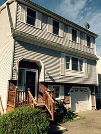 60 Valley Road Dracut, MA 01826 - Photo 15 of 15 a front view of a house with garden