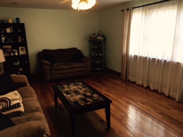 60 Valley Road Dracut, MA 01826 - Photo 5 of 15 a living room with furniture and a window