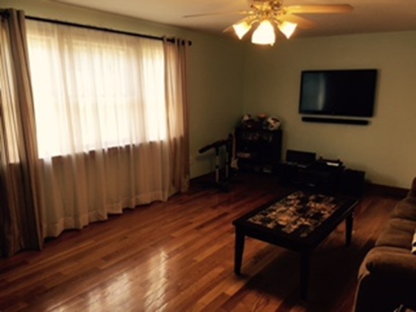 60 Valley Road Dracut, MA 01826 - Photo 6 of 15 a living room with furniture and a flat screen tv