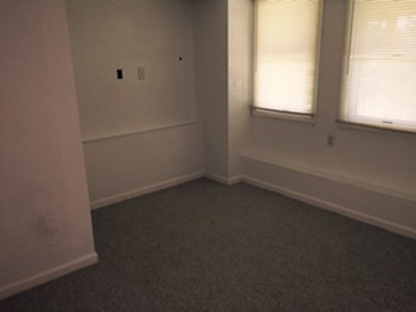 60 Valley Road Dracut, MA 01826 - Photo 8 of 15 an empty room with a window