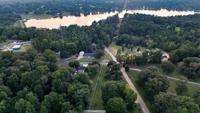 an aerial view of a house with mountain view