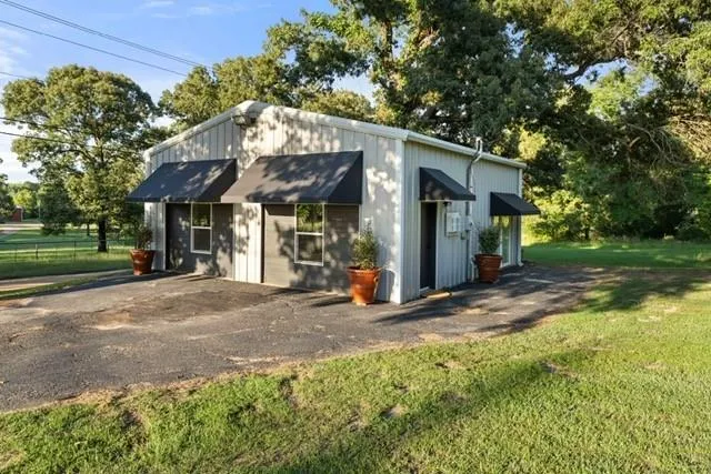 a view of a house with a park