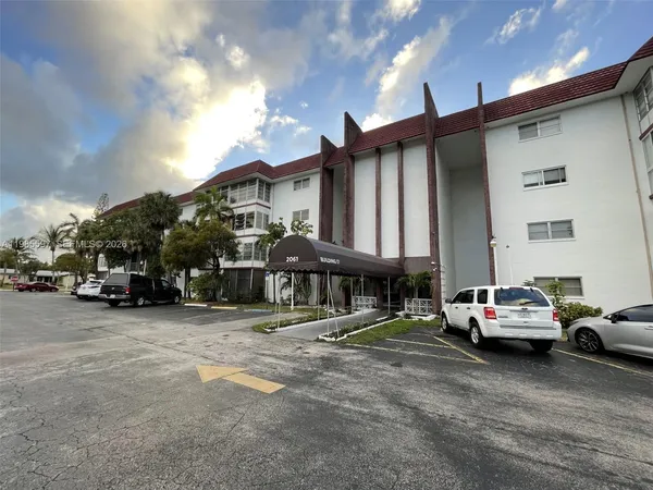 a car parked in front of a building