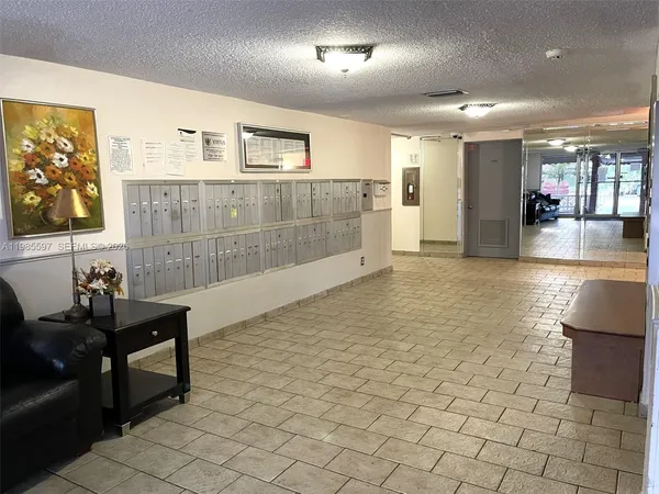 a view of a lobby area with furniture