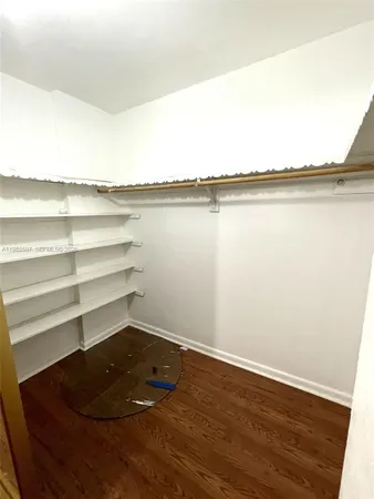 a bathroom with a bathtub and toilet