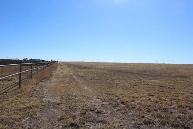 a view of an ocean beach and mountain