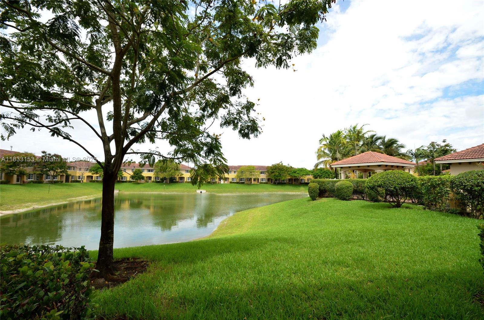 1909 Southwest 60th Avenue, Unit 1909 North Lauderdale, FL 33068 - Photo 19 of 19 a view of a garden with an outdoor space