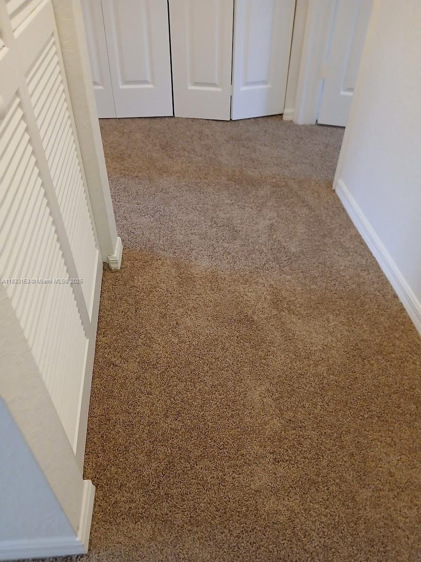 1909 Southwest 60th Avenue, Unit 1909 North Lauderdale, FL 33068 - Photo 5 of 19 a view of entryway with kitchen