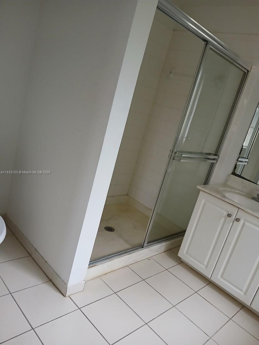 1909 Southwest 60th Avenue, Unit 1909 North Lauderdale, FL 33068 - Photo 8 of 19 a view of a garage