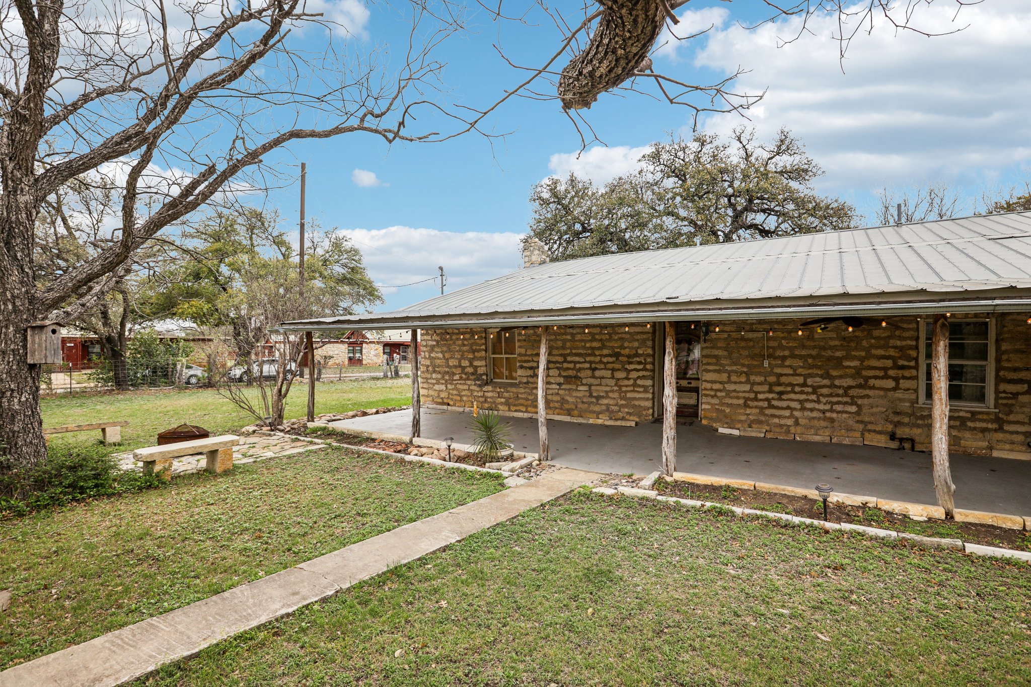 a view of a house with a yard and garage