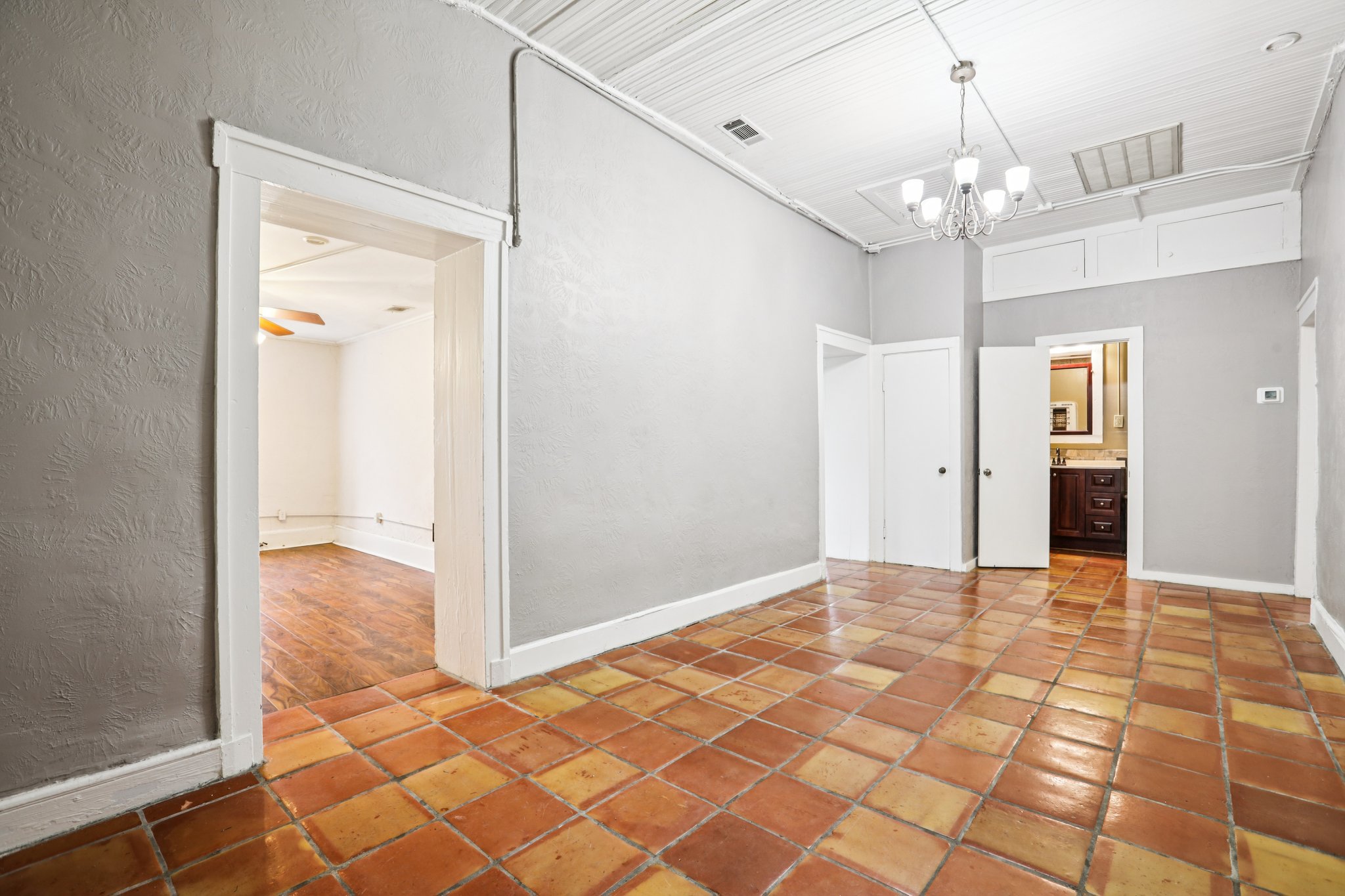 1801 Candee Street Georgetown, TX 78626 - Photo 11 of 14 a view of a hallway with a chandelier