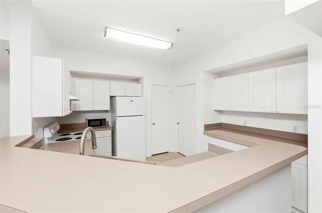 $379,000 | 231 Goldenrain Drive, Unit 101, Celebration, FL 34747